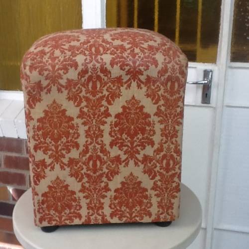 An Ottoman Newly Upholstered.