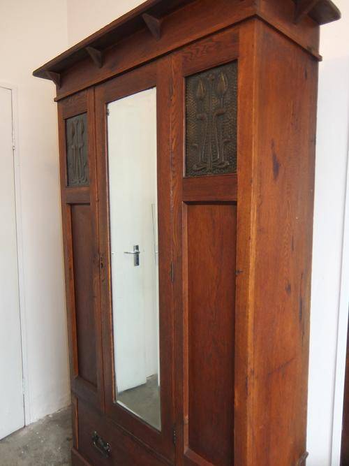 An Antique Single Teak Wardrobe with a Mirror in Front.