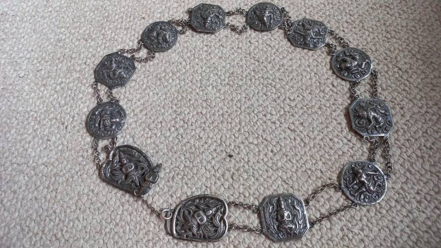 AN INTERESTING 236 gram BELLY CHAIN WHICH LOOKS SILVER-READ BELOW