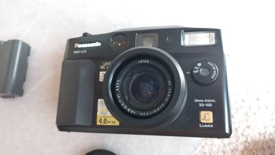 VERY CLEAN PANASONIC DMC-LC5 LUMIX CAMERA PLUS BATTERY AND QUALITY DOUBLE ZIP CASE SEE BELOW