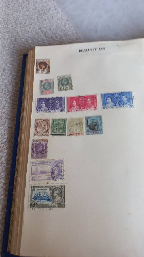 ALBUM WITH MANY COUNTRIES SOME NICE CHINA USA AND MORE-SOME CONDITION ISSUES
