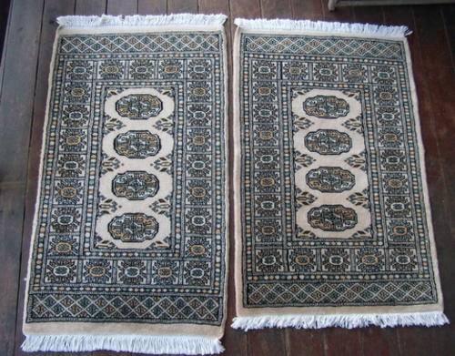 A SET OF PURE WOOL HANDWOVEN KARACHI BOKHARA RUGS IN AN ALMOST UNUSED CONDITION