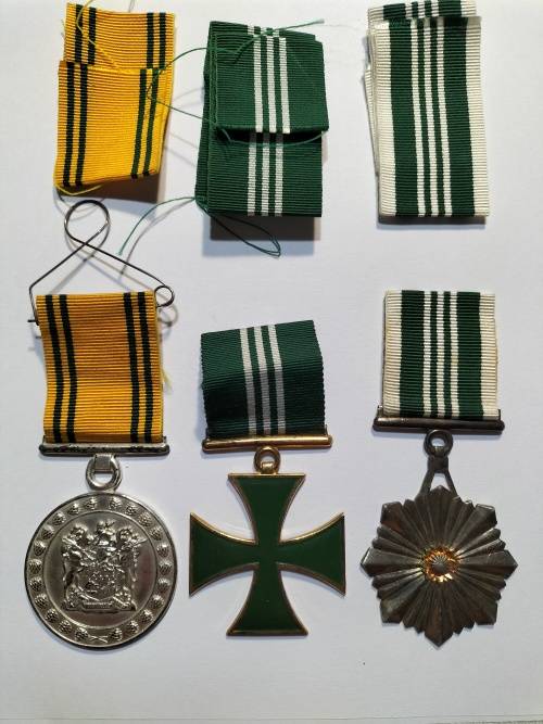 Large/Full Correctional Service Medals with extra ribbons and a metalbar