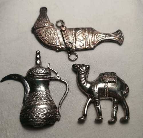 Sterling silver camel, jug and gun
