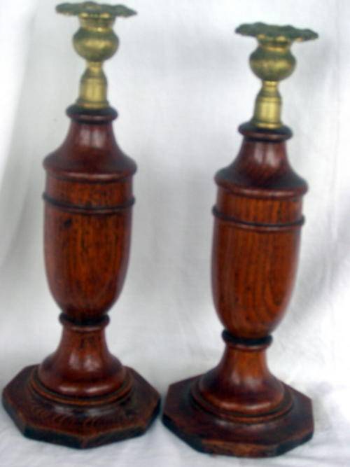 PAIR OF TURNED OAK AND BRASS CANDLESTICKS