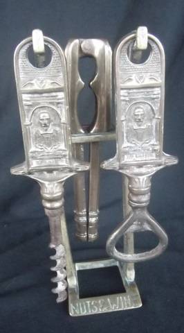 VINTAGE EMBOSSED BRASS WINE AND NUT SET
