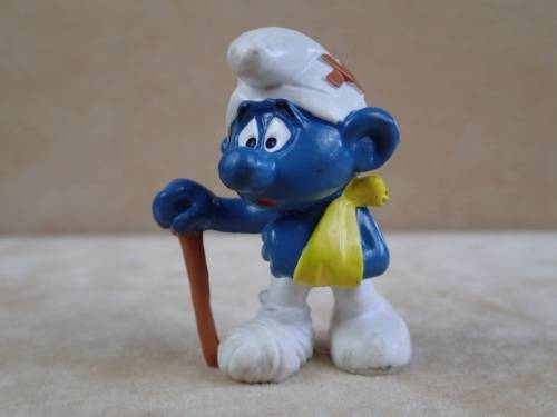 20097 Injured Smurf, vintage Smurfs figure. Shipping will only be charged once!
