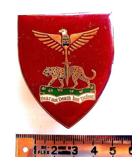 <-- Fear not Death but Defeat --> flash, badge, Special Forces or Airborne??? Perhaps Zambia???