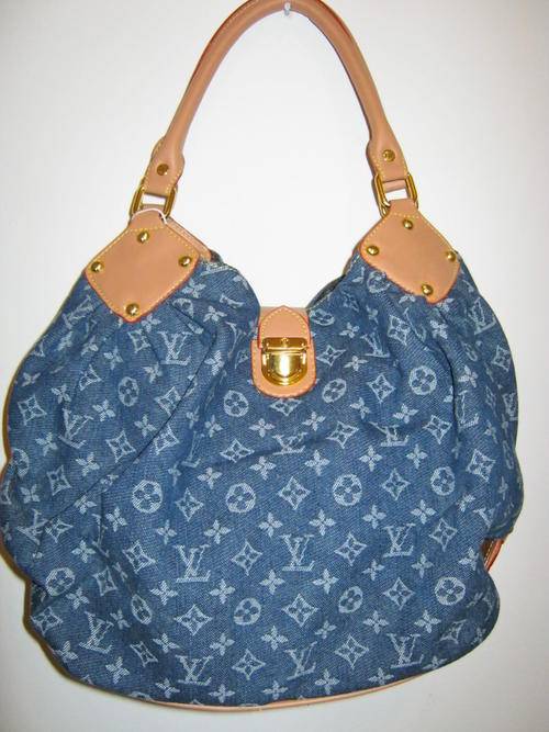 Dark Blue Denim Handbag with beige leather feel handle and gold accents