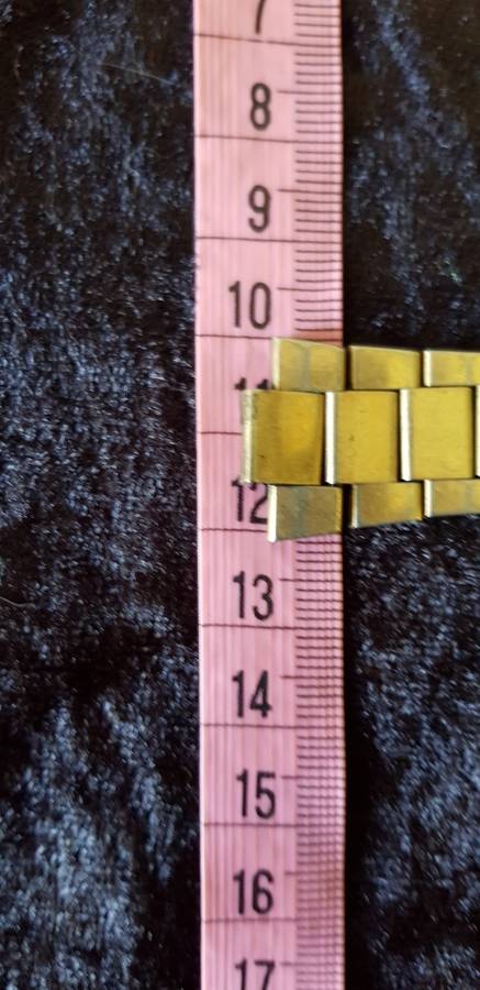 OMEGA BUCKLE AND ONE SIDE OF STRAP