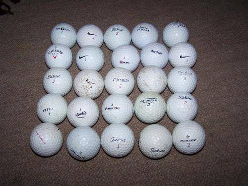 25 Golf Balls in various condition.