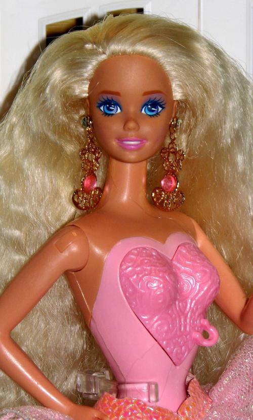Locket Surprise Barbie doll made by Mattel