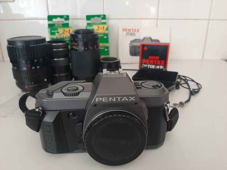 Penta P30 35mm Film Camera and lenses with accessories.