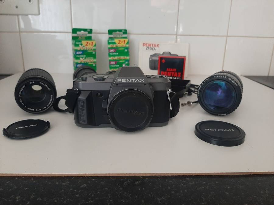 Penta P30 35mm Film Camera and lenses with accessories.