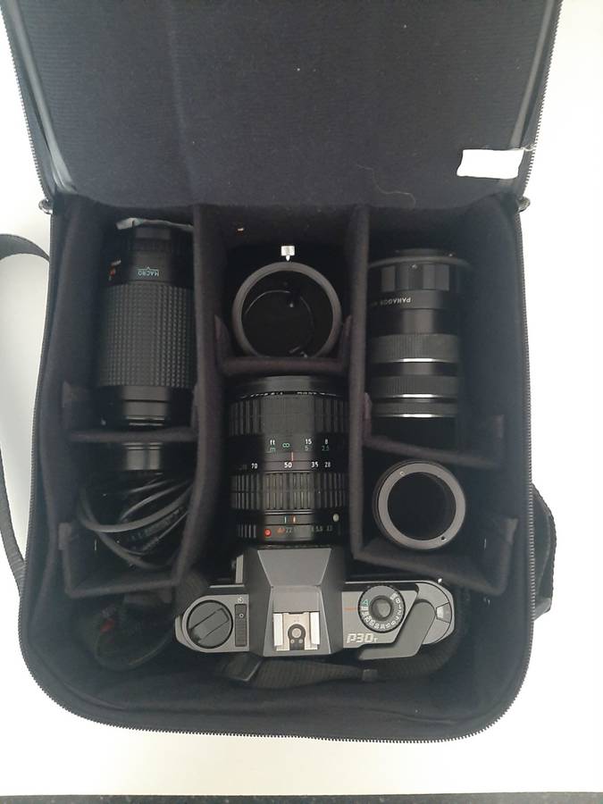 Penta P30 35mm Film Camera and lenses with accessories.