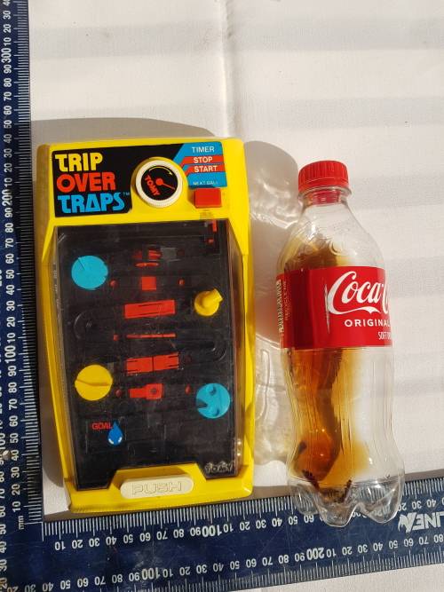 Tomy Trip over Traps Handheld Game