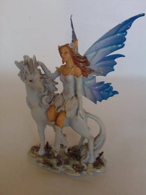 Fairy on Unicorn ornament
