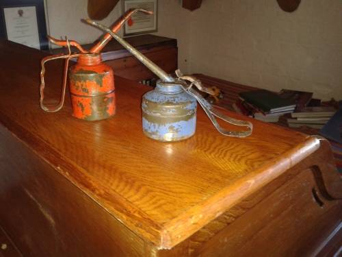 Two vintage oil cans