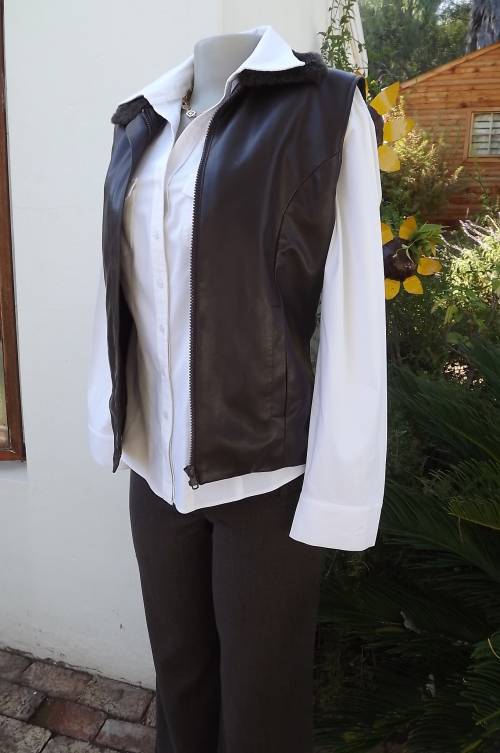 Chock brown InWear International waistcoat in PVC outer.Size 32/8.Knitted backing