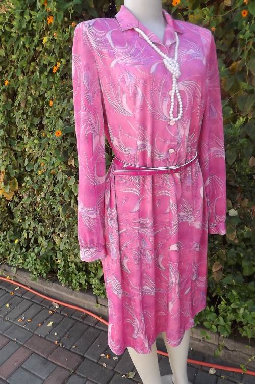 Beautiful long sleeve pink dress with perwrinkle feather pattern.Size 40/16 by Nuwell Rosecraft