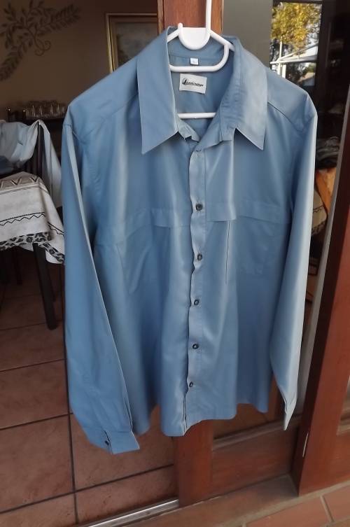 Steelblue casual long sleeve polyester shirt by Exchange.Size L .Chest 116cm.Good condition