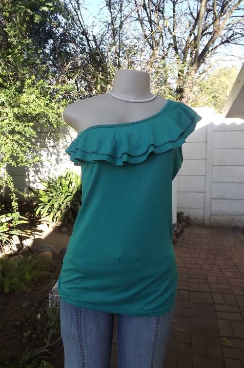 One shoulder turquoise long cotton stretch top by Image.Size 36/12.Used but still in good condition