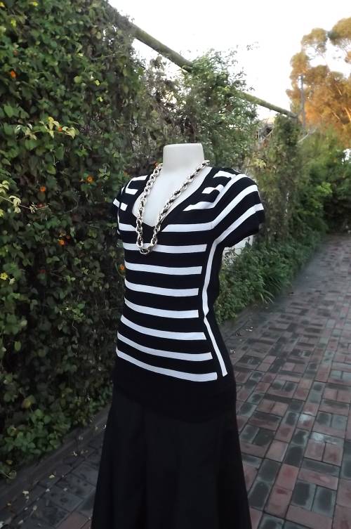 Monochrome striped "OBR" top size 36/12.Knitted rayon/cotton yarn with stretch.