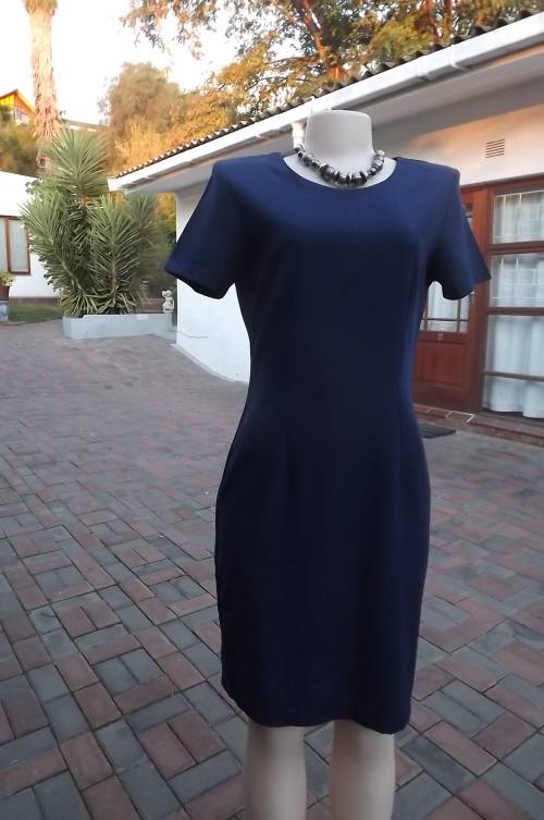 Classic navy pencil calf length dress with short sleeves.Size 34/10.Cotton/linen blend fabric