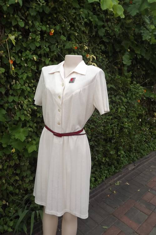 Butter soft rich cream 80's polyester/rayon knit dress.Size 38/14 by FOSHINI. Yoked shoulders