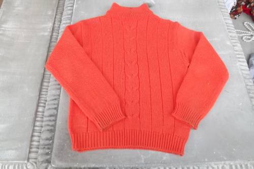 Beautiful tangerina acrylic knit jersey for 9 to 10 year old.High neckline.In new condition