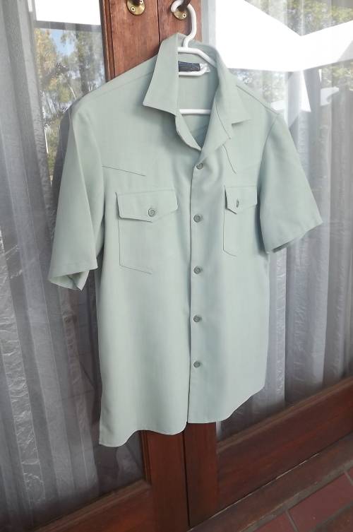 Safari suite jacket in mintgreen.Size 102R by BENITH LEISURE wear.In polyester blend.
