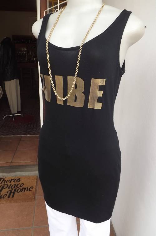 Sexy black vest type long RT top/short dress.Size 32/8.In stretch polyester with gold VIBE logo