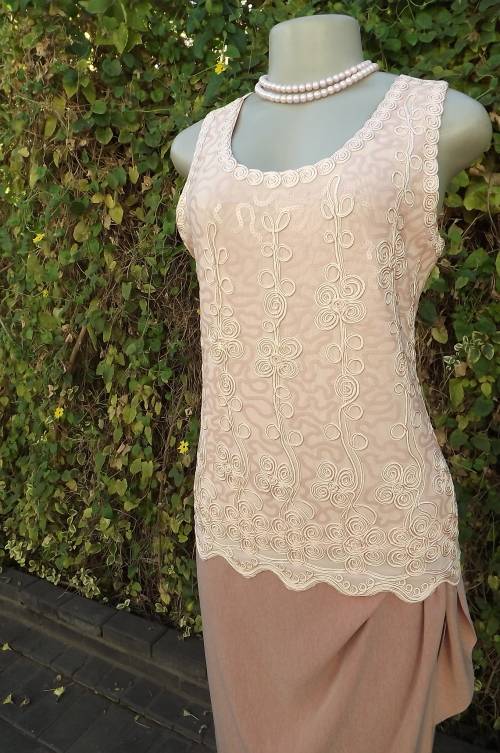 Amazing evening peach colour top in 100% sheer polyester.Front lined.Size 34/10.New never used