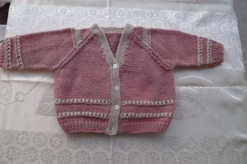 Pretty pink and beige cardigan for 12 month old girl.Hand knitted in acrylic wool.New condition.