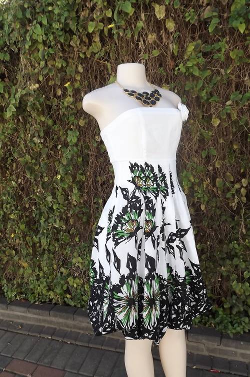 White strapless cotton dress size 30/6 with charming black and green nature design on baloon skirt