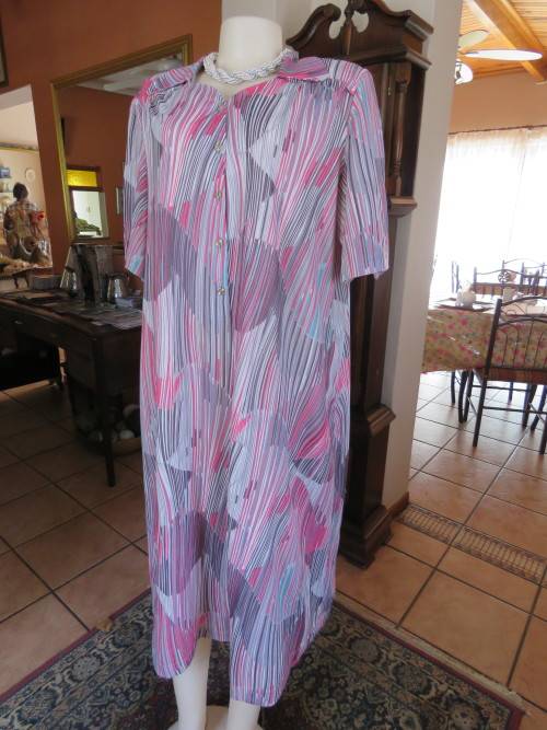 Shift dress by ALVECO in 100% wash + wear polyester.Size 46/22.Good condition