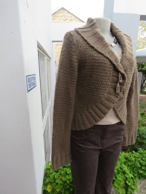 Cosy light brown bolero style cardigan in double knit acrylic yarn.Size 36/12 by ATMOSPHERE