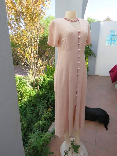 Dirty pink button down dress by TOPICS in size 32/8.Empire waist with pretty floral embroidery.