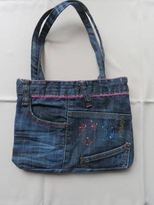 Cute little hand denim jean handbag.Made from used JACKY JEANS.Size 27x21cm.New Item.