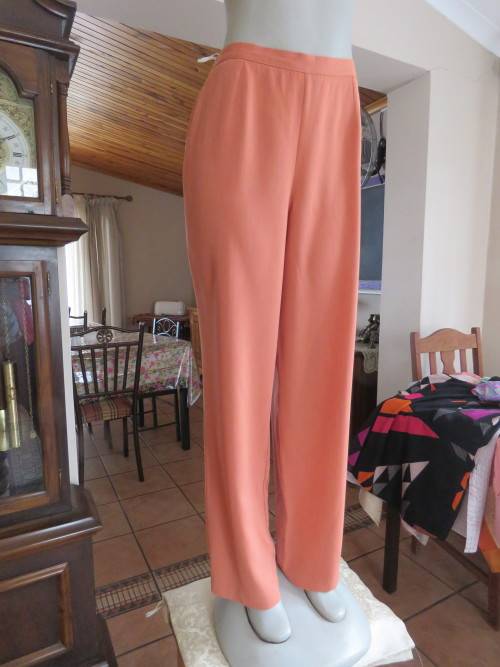 Brick colour comfortable summer pants by 'WOOLWORTHS' in 38/14.Used but still in fine condition.
