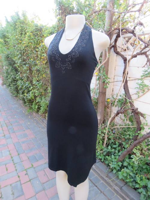 Top of the line black dress by 'LES POSSEDES' IN 32/8.Made in France.In polyamide stretch.New cond.
