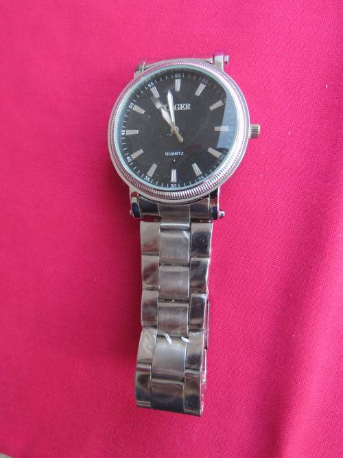 New quartz watch by 'XAGER'.Black face.Stainless steel strap.Working.New.
