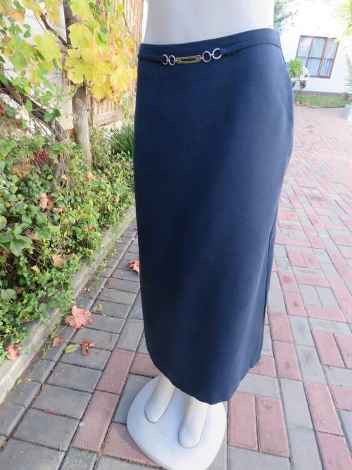 Make a statement in this belted navy ankle length pencil skirt.Size 34/10 by `FASHIONETTE`.New cond