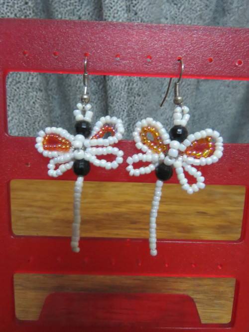 Pair of ethnic piercing earrings.Insects made from beads.New.