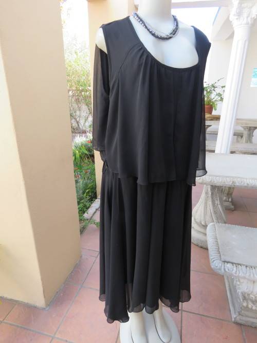 Glamorous sleeveless black special occasion dress by 'DONNA CLAIRE' in 50/26.New condition.