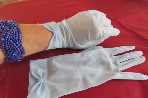 Pair of powder blue chiffon gloves. Size Medium. As new.