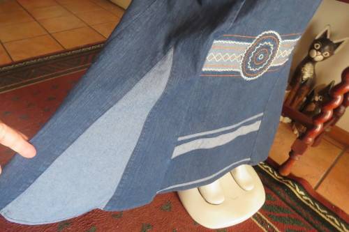 Top of the line ankle length trumpet style cotton stretch denim skirt in size 36/12.
