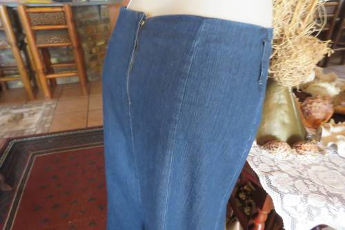 Top of the line ankle length trumpet style cotton stretch denim skirt in size 36/12.