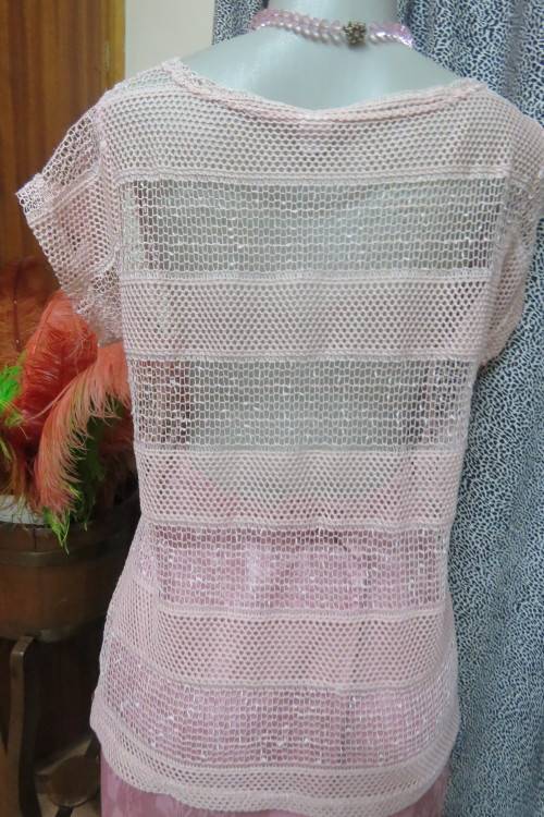 Cute dusty pink mesh type short sleeve top with horizontal lines. Round neckline. Size 36/12.