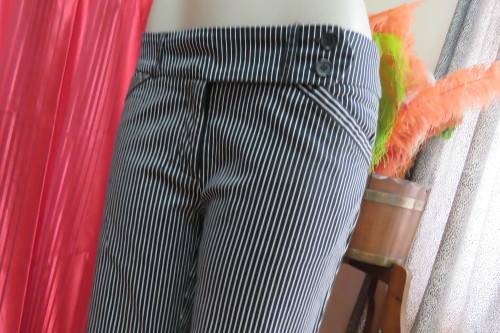Show stopping low rise black and white striped pants with wide waistband. Size 36/12.